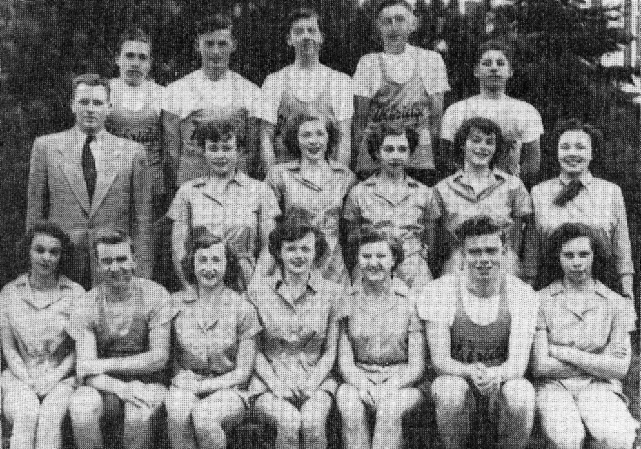 (Click to magnify) Poor quality original ... FIRST ROW: A. Calbeck, C. McGuckin, K. Arnold, J. Pearson, B. Meyers, J. Turner, R. Beach; SECOND ROW: Mr. Russ, F. Smith, K. Crosby, M. Leask, S. Page, Miss O'Shaughnessy; BACK ROW: B. Gribben, H. Fawns, R. Ta