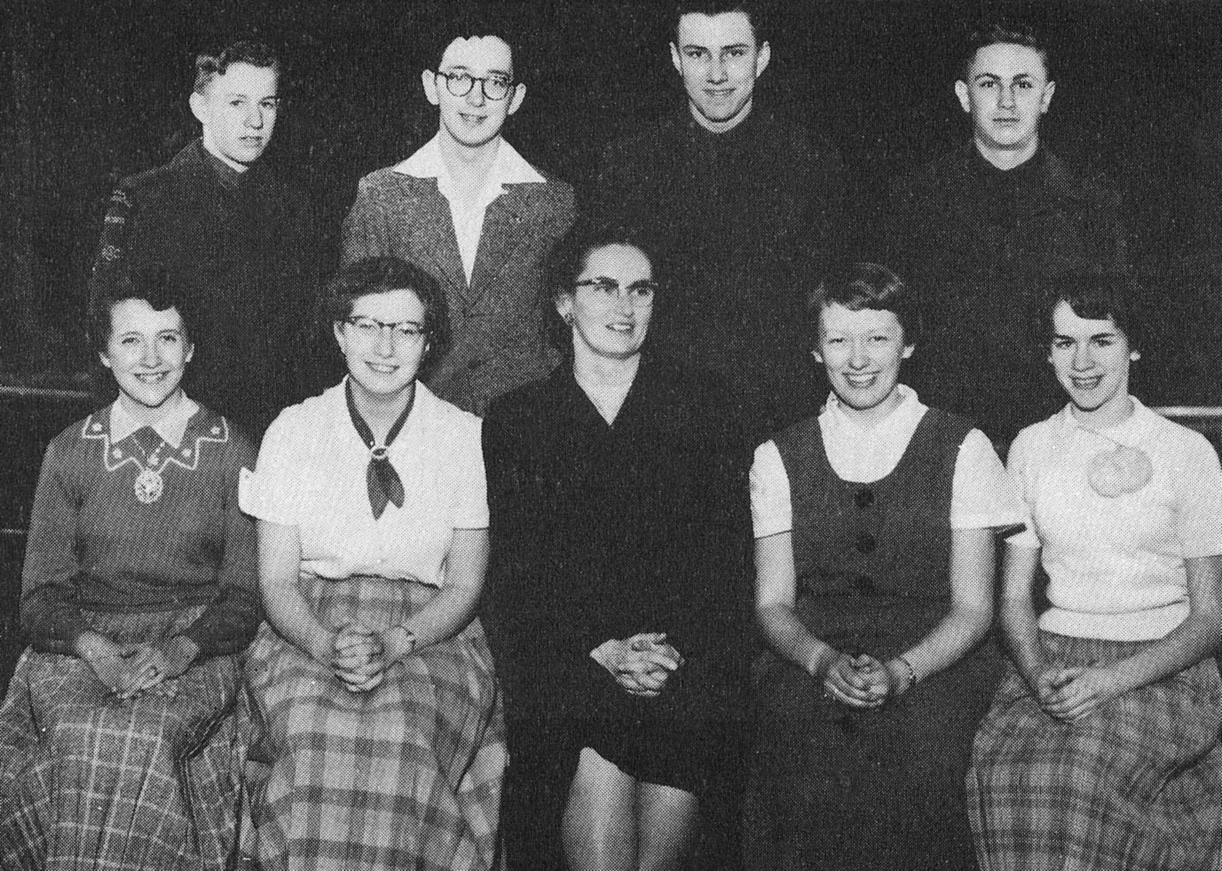 (Click to magnify) FRONT ROW: A. Smalley, L. Cullingham, Mrs. Lennox, H. Feasby, President, V. Noble; BACK ROW: Lloyd Wilson, P. Granger, E. May, K. Hockley.