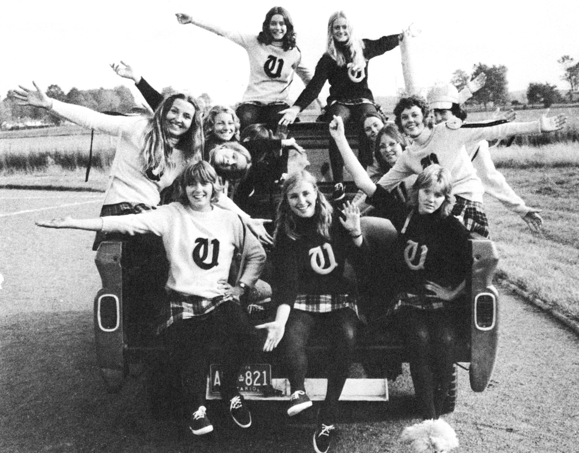 (Click to magnify) We can give you the names of the cheerleaders but not in any specified order - Alas!:  Kathy Mason, Jane Akerman, Monica Bayard, Carola Bolle, Jane Emslie, Kim Grieg, Linda Kaye, Denise McConney, Wendy McConney, Val. McDonnell (captain)