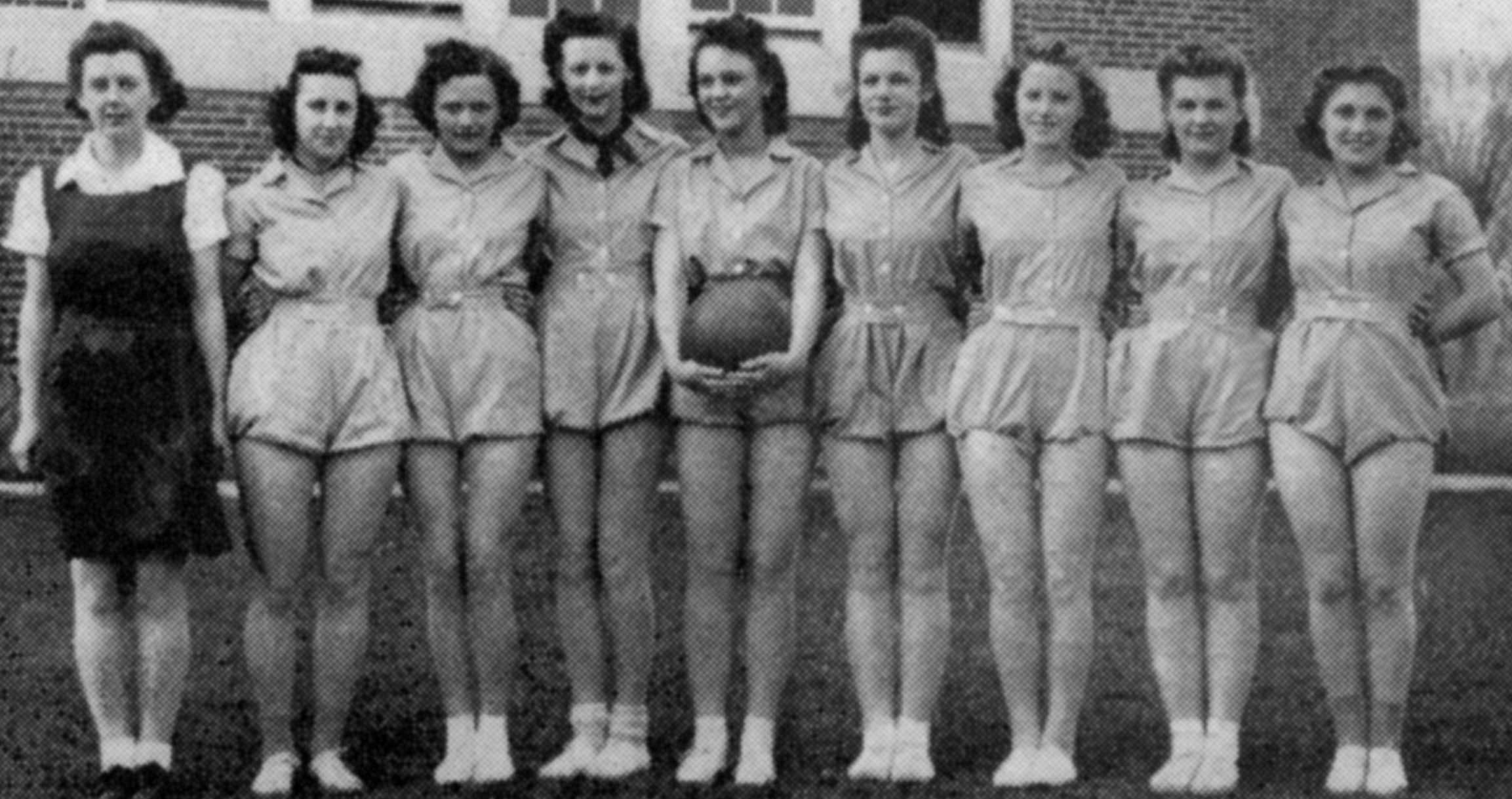 (Click to magnify) While the 'Girls' Basketball team is shown, there is no explicit caption identifying these team members. In the yearbook, it gives the following:  SENIOR GIRLS' TEAM: FORWARDS: Marion Yule, Aileen Feir, Doris Pollock, Marion Mustard (ca