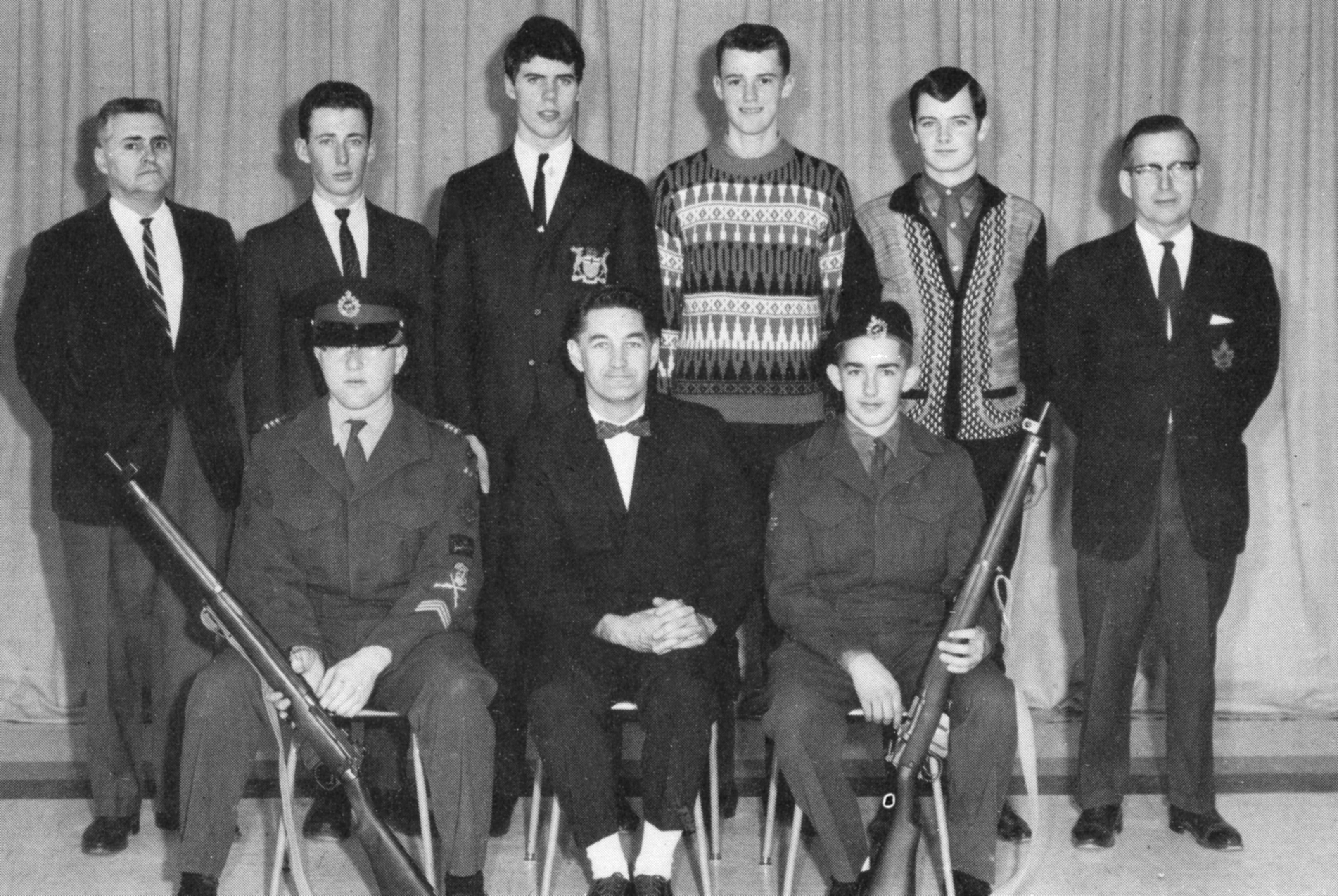 (Click to magnify) FRONT ROW: M. Ross, Mr. Brunne, D. Moore; ***BACK ROW: Mr. A. McConney, Keith St.John, Larry Manley, G. Hockley, R. Wakeford, Mr. T. Smith.