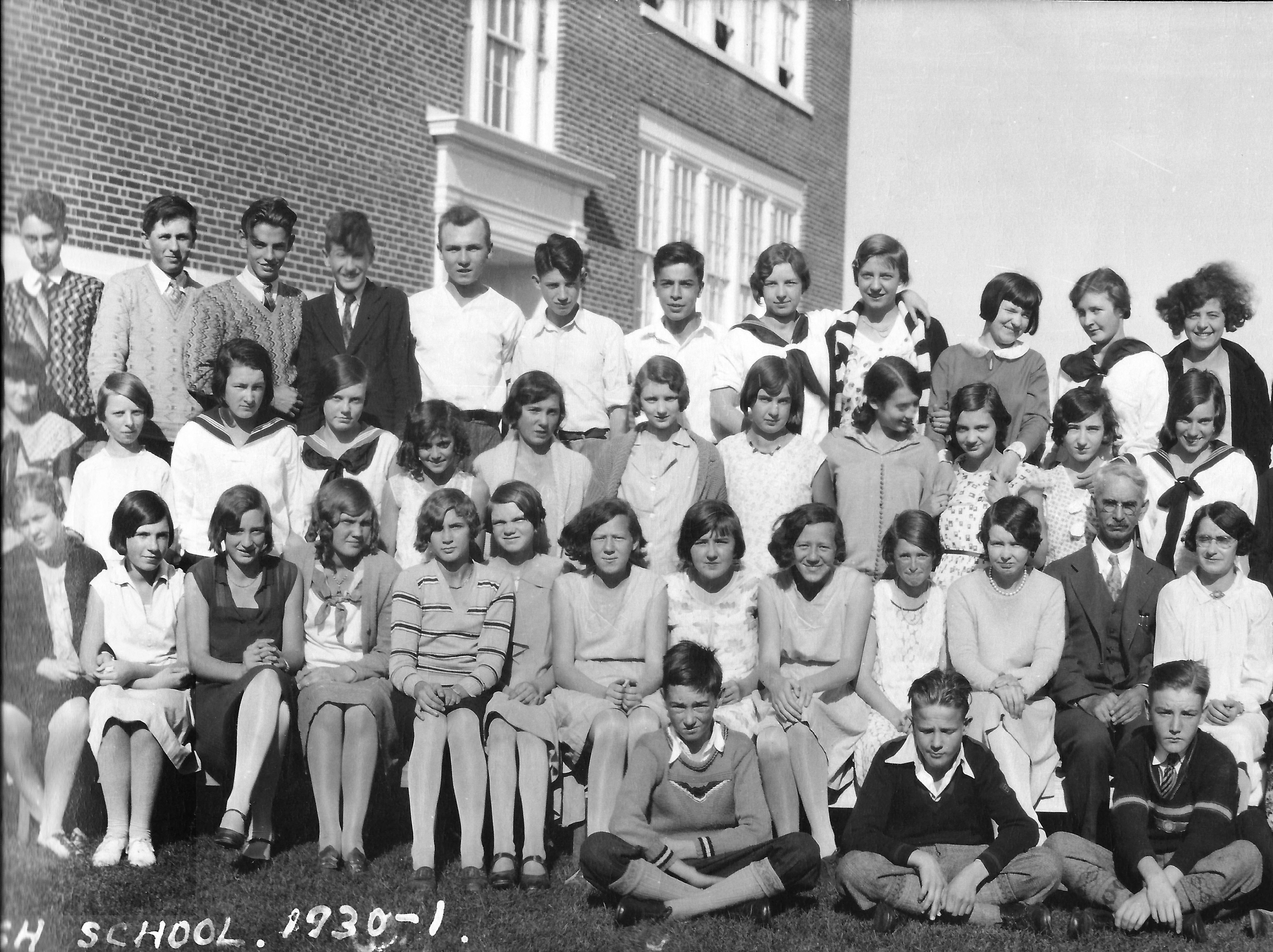 (Click to magnify - multiple levels of magnification) This photo has been heavily Photoshopped to remove visual artifacts) NOTE: the principal: J.E. Burchell, is near the right edge of the 2nd row.